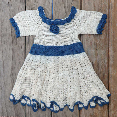 Baby blue and white dress with floral design made from Eri Silk yarn