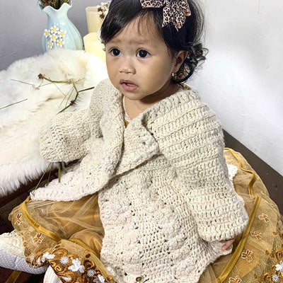 Baby Girl Wearing Eri Silk Sweater Made By Muezart India