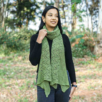 Green shawl knitting pattern using Garter stitch and Lace stitch