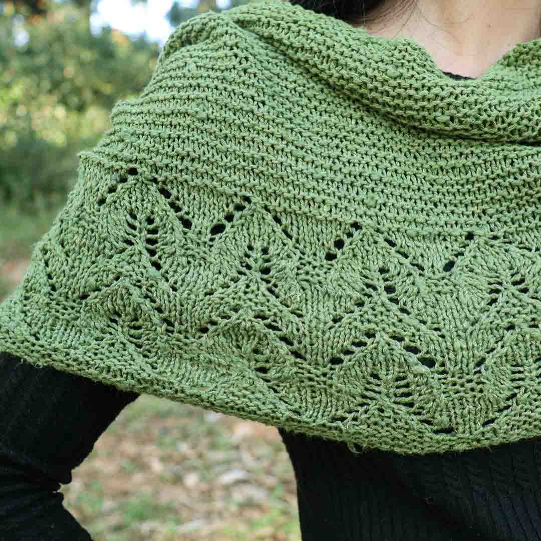 Green shawl knitting pattern using Garter stitch and Lace stitch