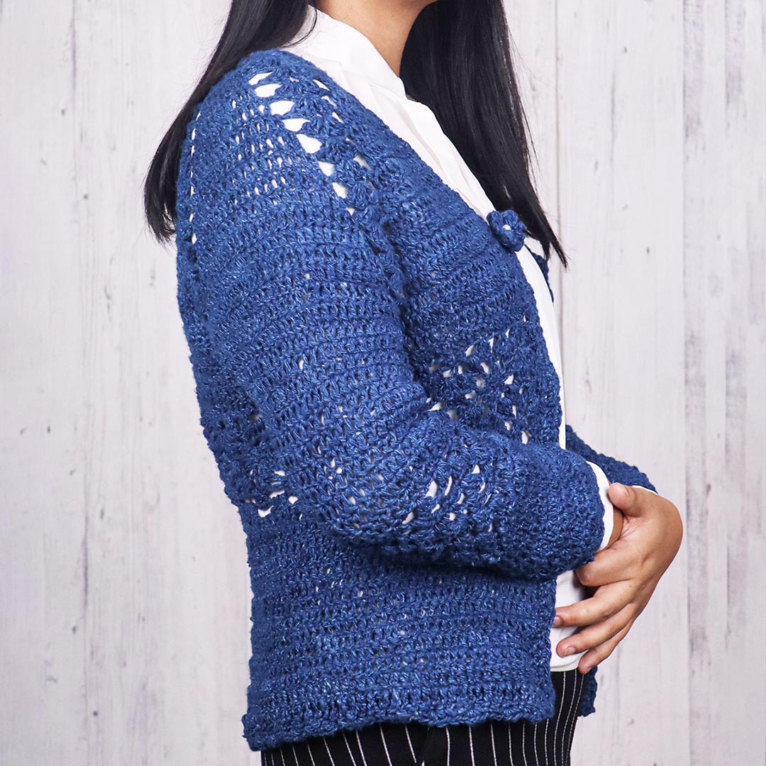 A women wearing a beautiful blue Indigo Sweater made from Eri Silk Yarn