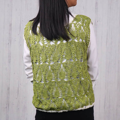 A Women Wearing A Green Pineapple Sleeveless Eri Silk Top - Best Eri Silk Top For Women