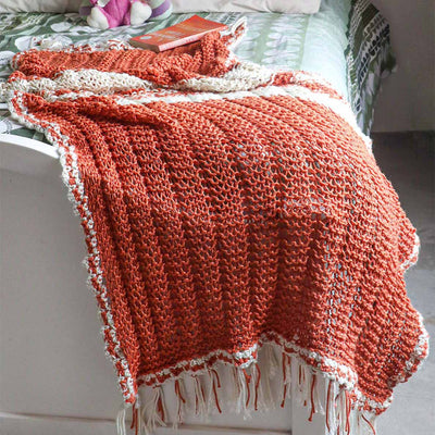 An Orange Silk Summer Blanket in  A Bed - Muezart India